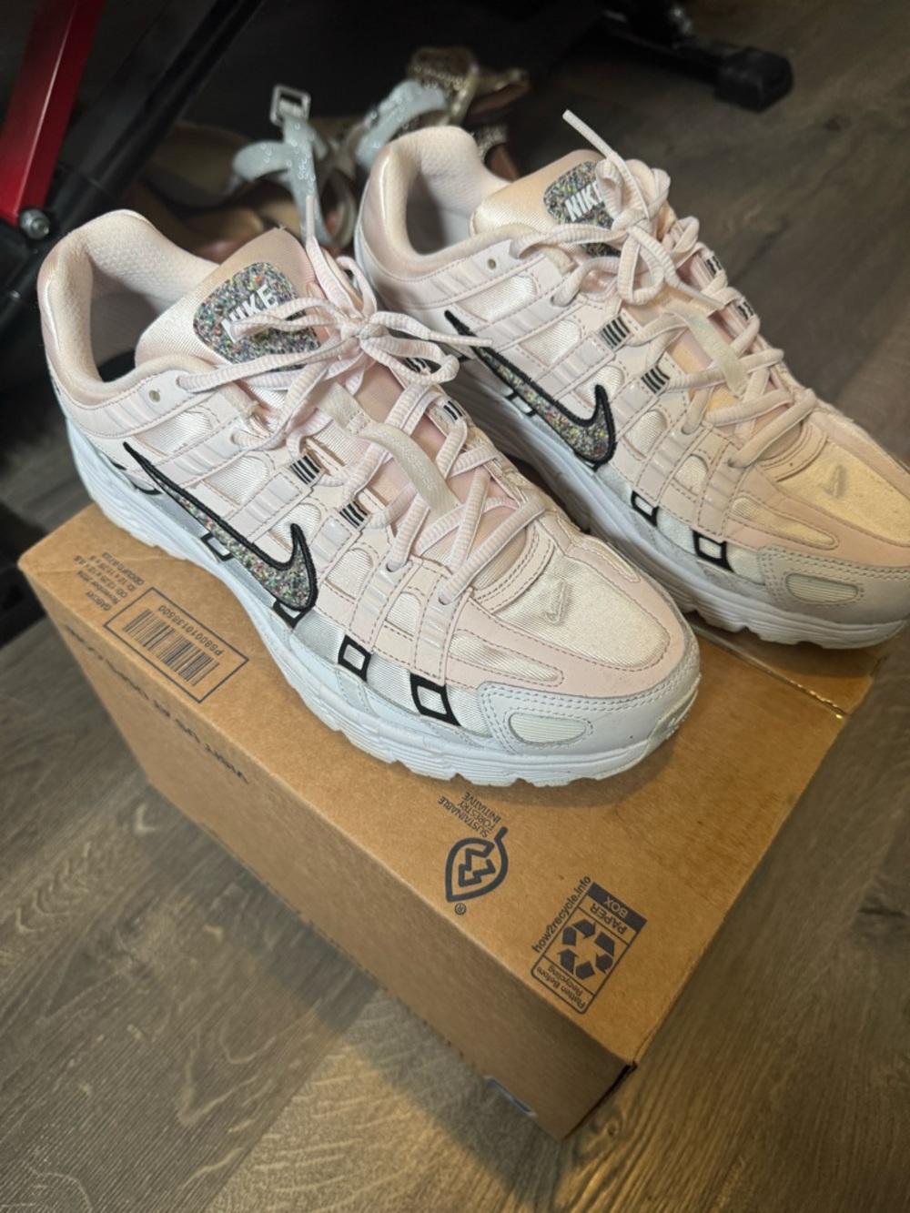 Nike Women's Pale Pink and White Sneakers with Multi Color Swoosh